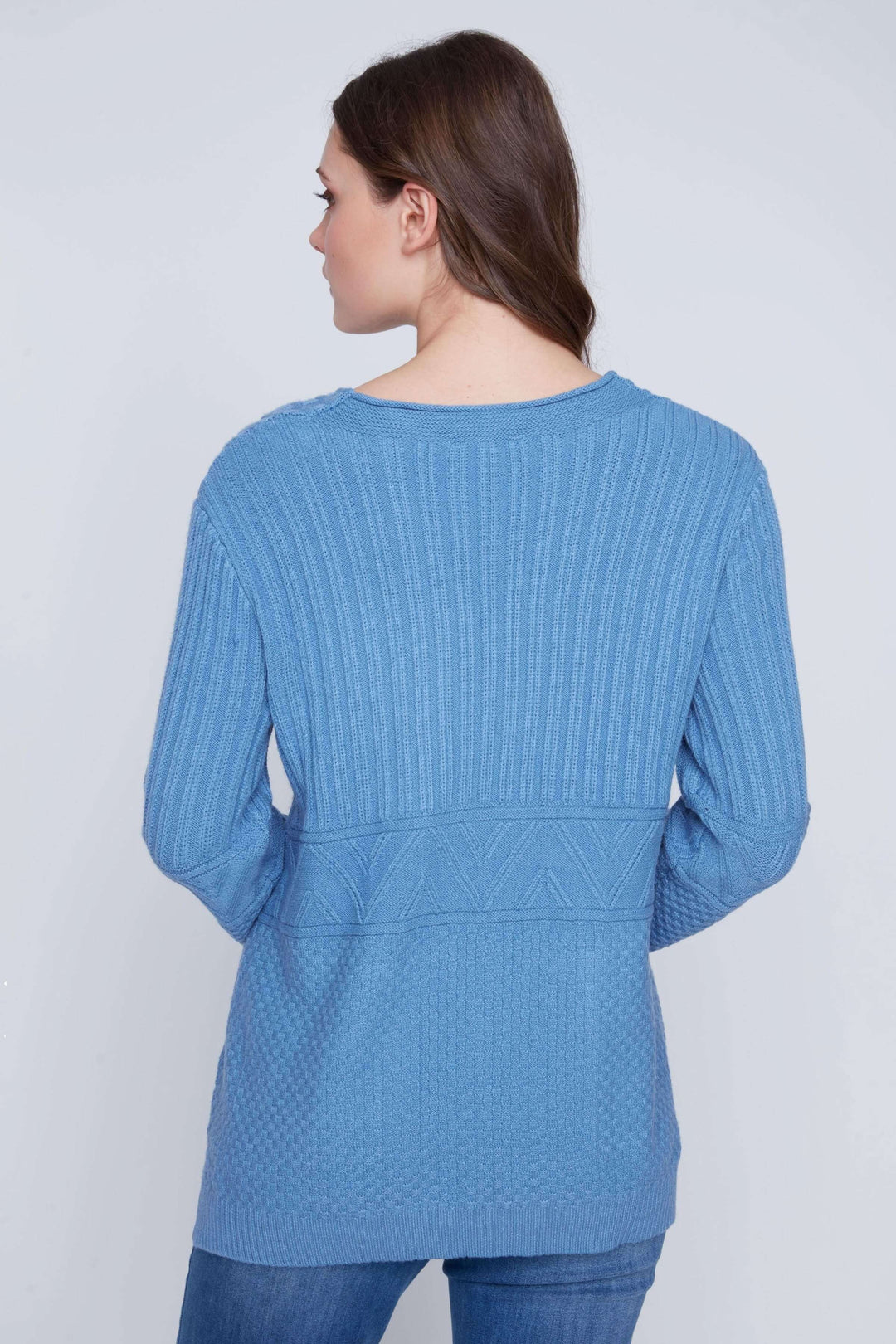 Tunique en tricot bleue, vue arrière, mettant en avant le design texturé et la coupe ample.