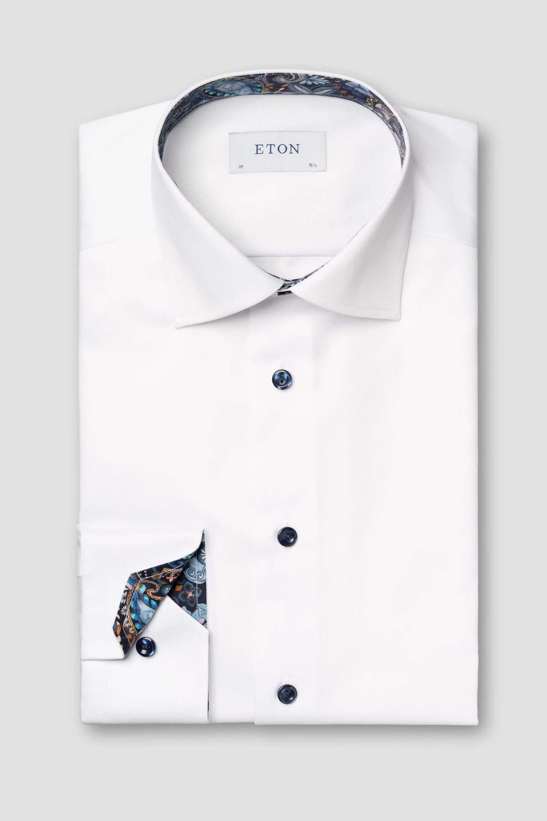 White shirt with print on collar and cuff