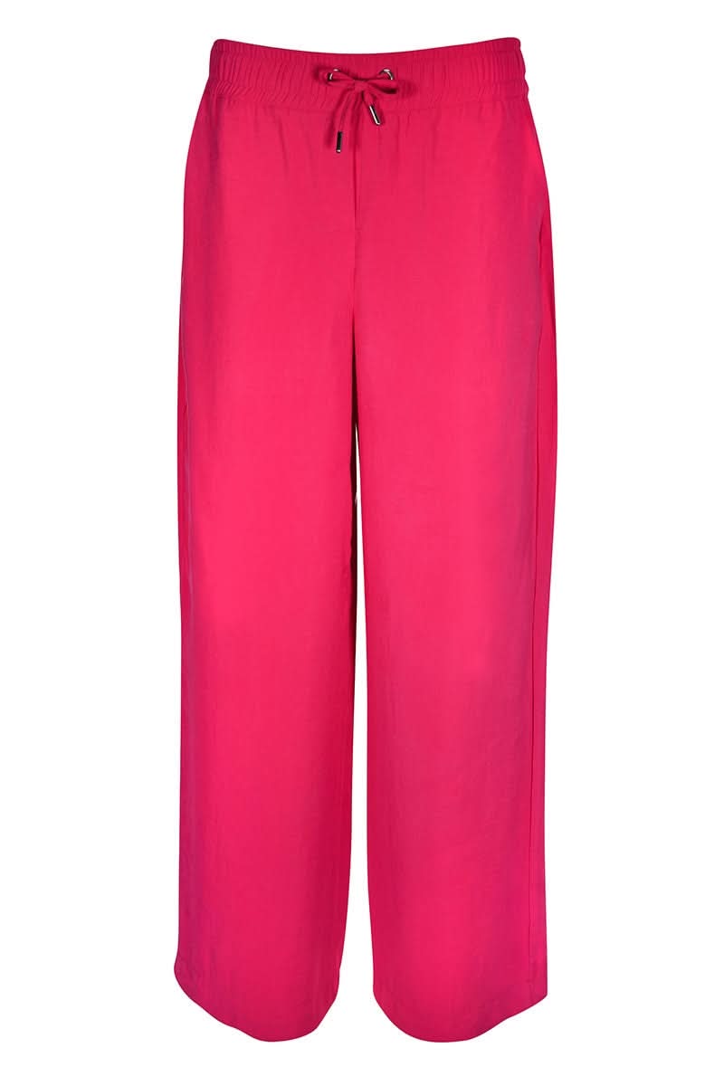 Pantalon jogging fluide rose avec taille élastique et cordon de serrage, offrant confort et élégance décontractée.