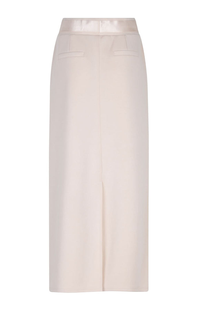 Jupe longue beige à taille élastique, finition douce, cordon de serrage, style minimaliste.