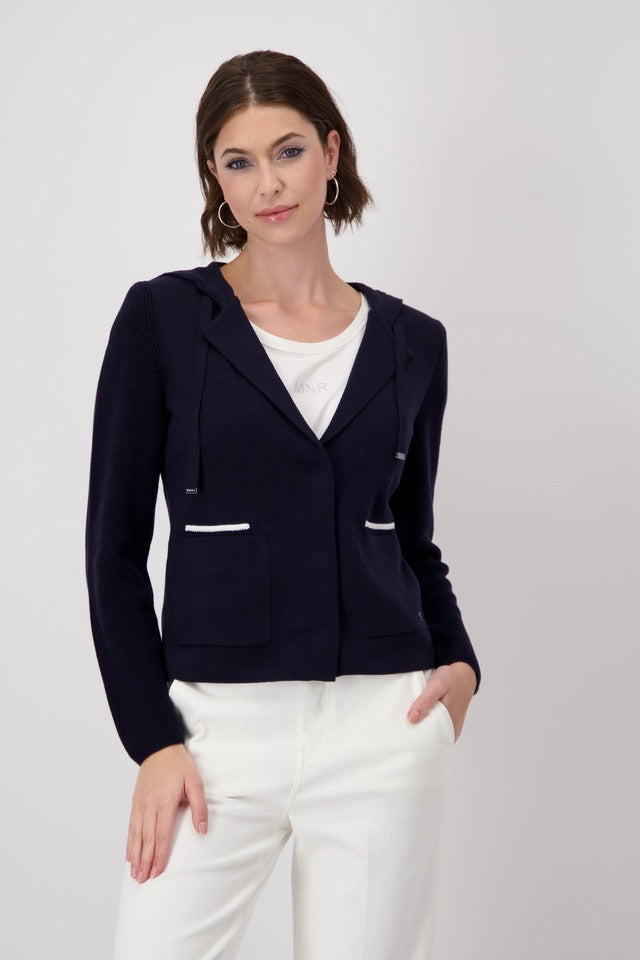 Jacket with knitted sleeves