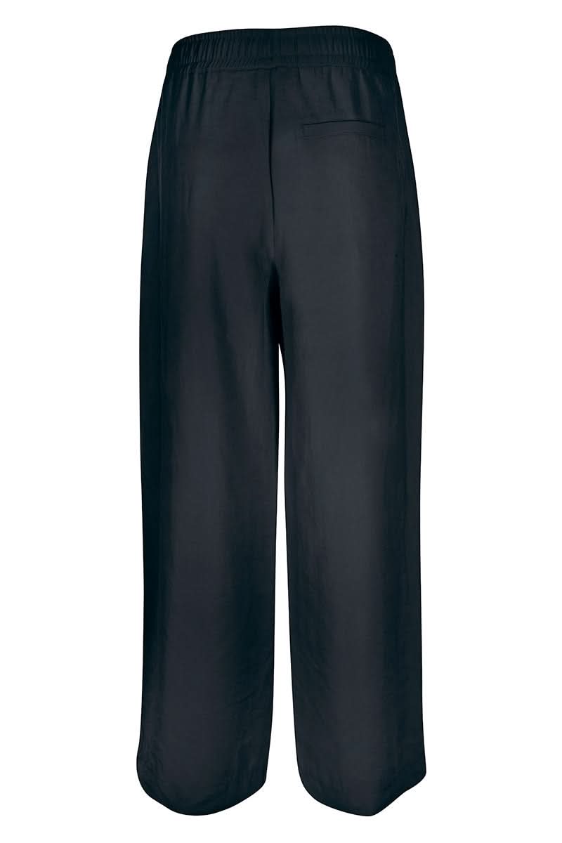 Pantalon jogging fluide avec coupe ample et taille élastique, idéal pour un style moderne et décontracté.