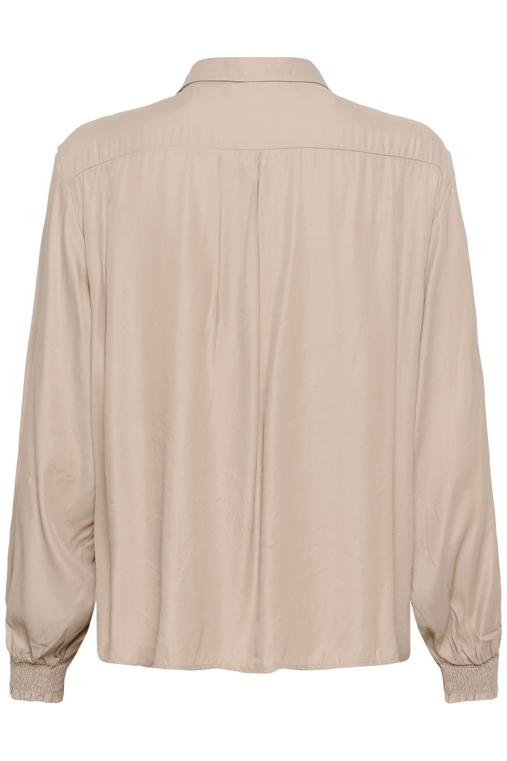 Blouse Nola fluide à poignets smockés élégante et intemporelle, vue arrière, facile à porter pour travail et week-end.