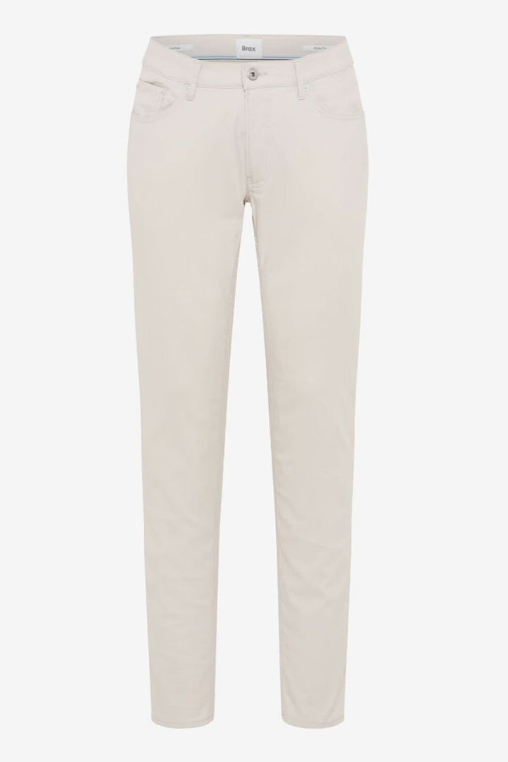 Pantalon ajusté longueur cheville avec tissu confortable et poches, parfait pour un look moderne et épuré au quotidien.