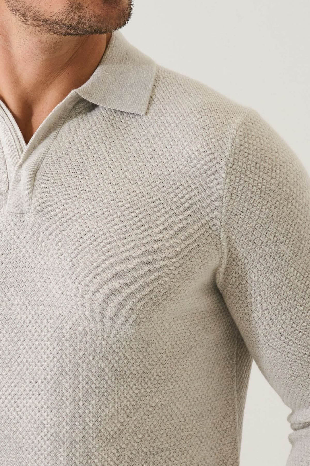 Polo zippé texturé en laine mérinos extra-fine