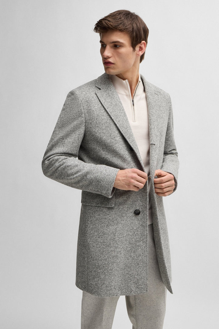 Herringbone coat with removable closure