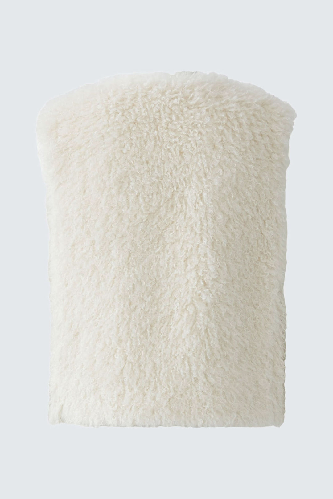 Veste sans manches en fausse fourrure douce, couleur crème, style moderne et tendance, parfaite pour les superpositions.