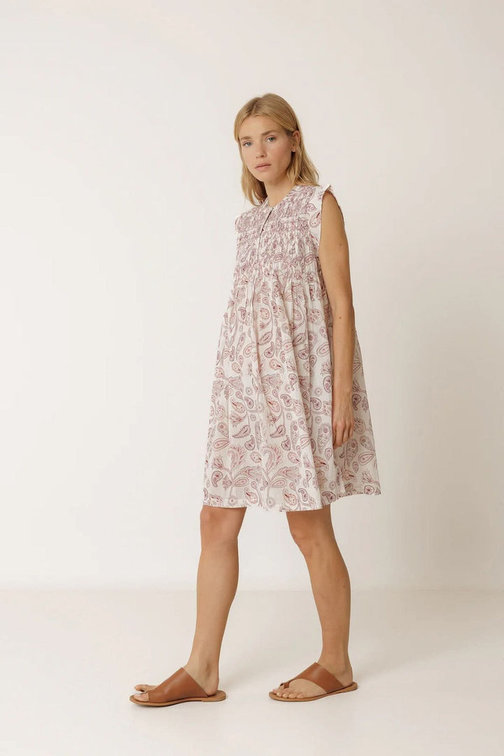 Short, flowing dress with a paisley print