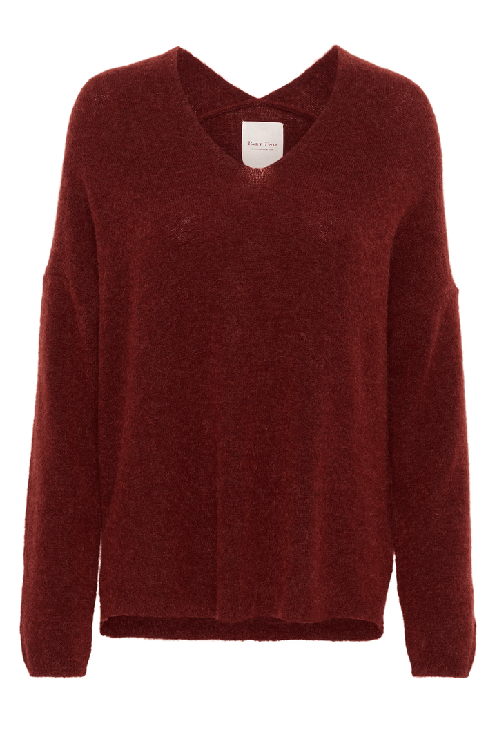Tricot Titina, pull rouge minimaliste avec col en V, coupe droite et manches longues, idéal pour un look casual ou élégant.