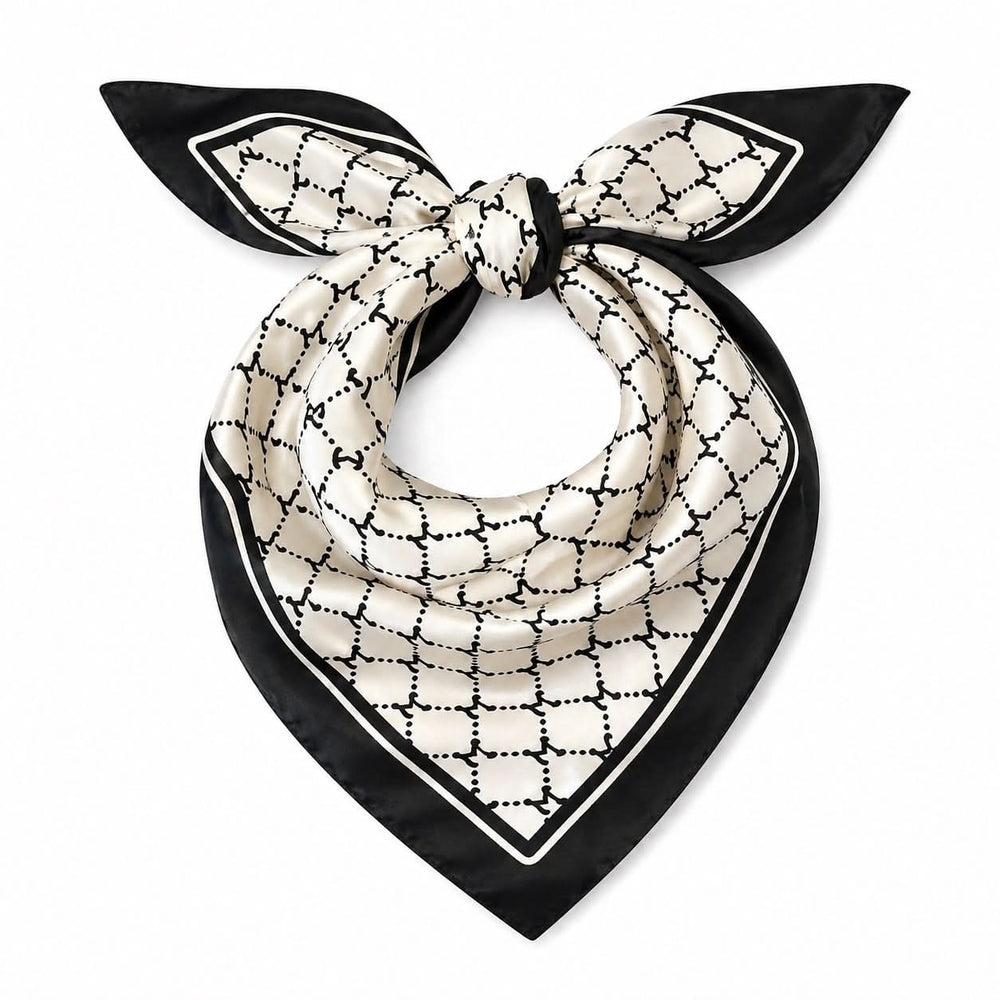 Foulard carré imprimé graphique avec bordure contrastante, format 70x70 cm, léger et polyvalent pour un style élégant.