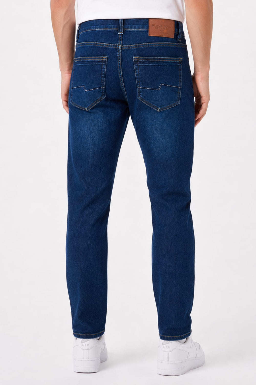 Vue latérale jean extensible noir homme avec coutures apparentes - Valérie Simon