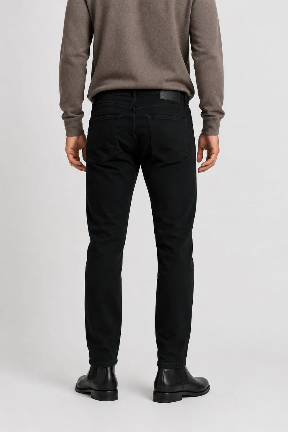 Vue de face jean extensible Black Bull pour homme noir avec coutures contrastées - Valérie Simon