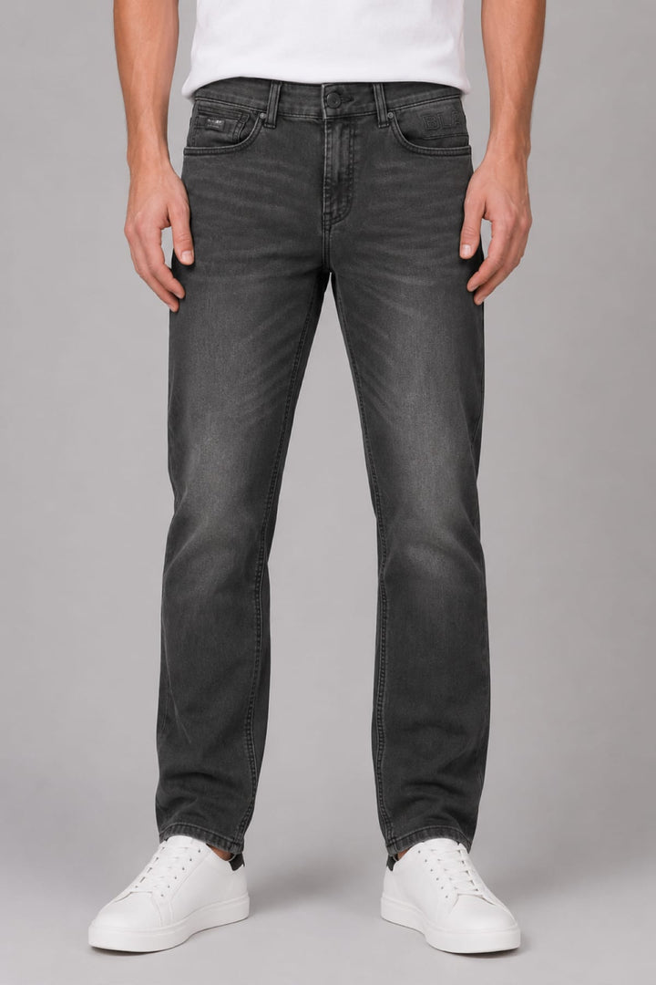 Vue de côté jean moderne Black Bull pour homme noir avec coutures apparentes - Valérie Simon