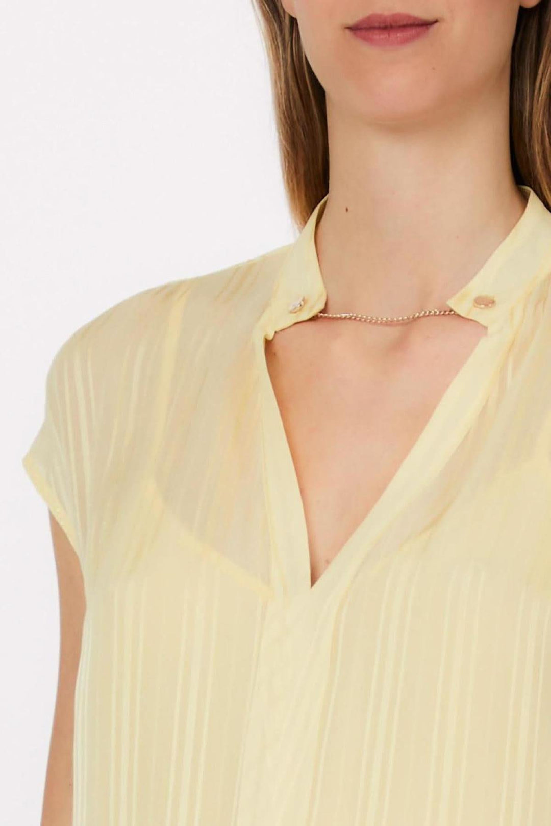 Flowy blouse with an open neckline