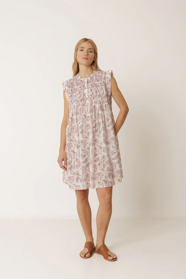 Short, flowing dress with a paisley print