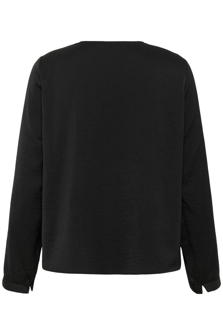 Vue arrière de la blouse Auda, noire, à coupe fluide et manches longues.