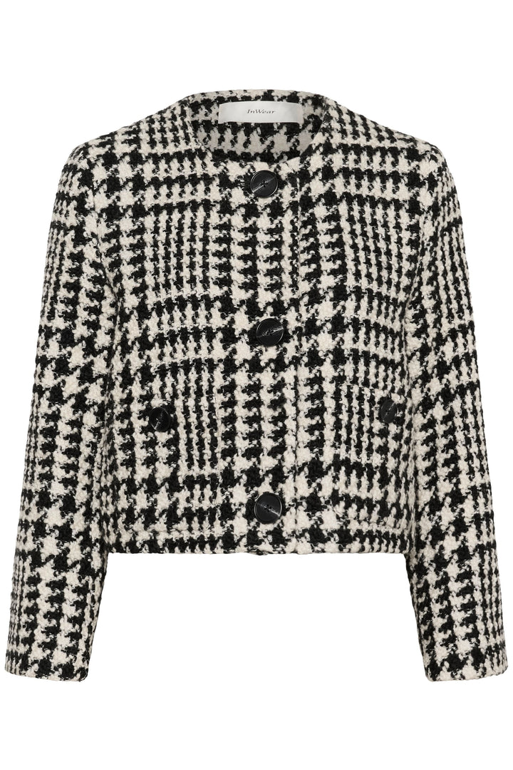 Veste courte à motif pied-de-poule, élégante avec coupe structurée, parfaite pour un look sophistiqué.