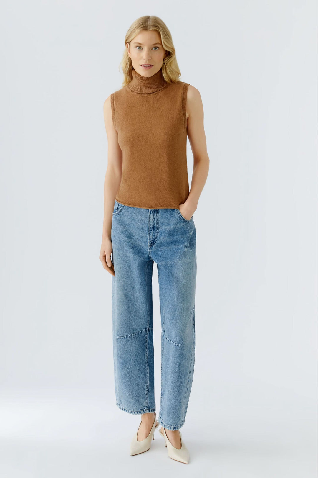 Sleeveless turtleneck sweater with openwork back