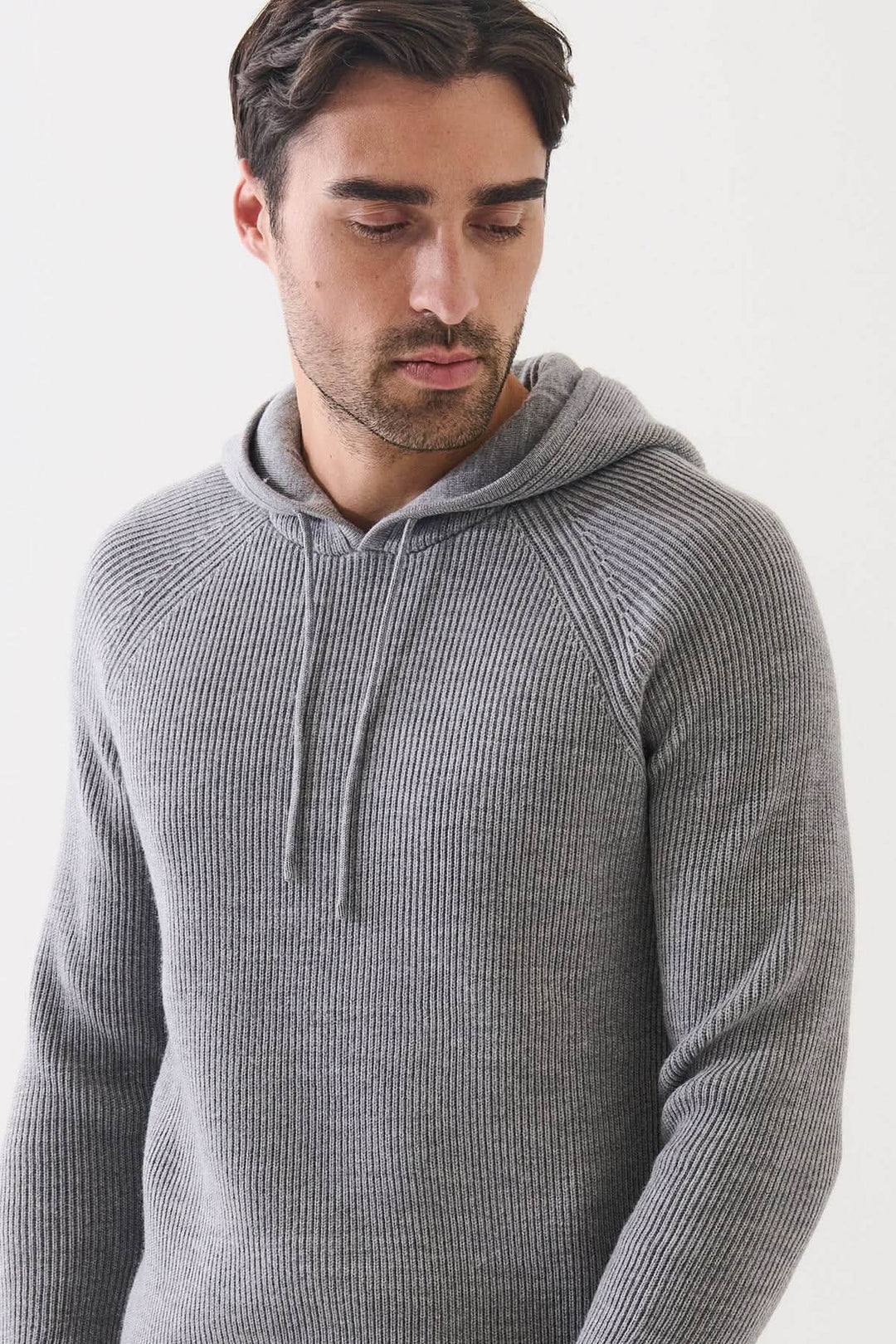 Chandail à capuche en laine mérinos extra-fine côtelée