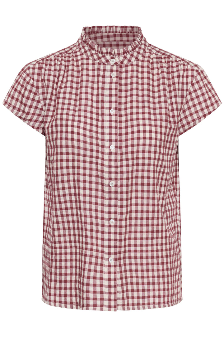 Blouse Bjanka à carreaux col montant boutonné avec manches courtes, idéale pour un style décontracté et soigné.