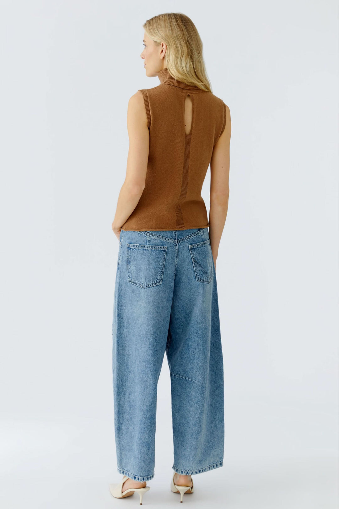 Sleeveless turtleneck sweater with openwork back