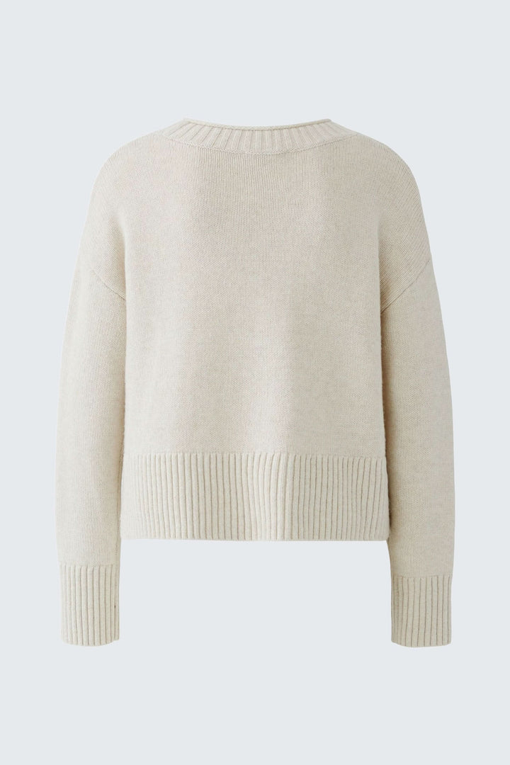 Chandail beige à coupe droite avec finitions côtelées, vue de dos, polyvalent pour un look quotidien.