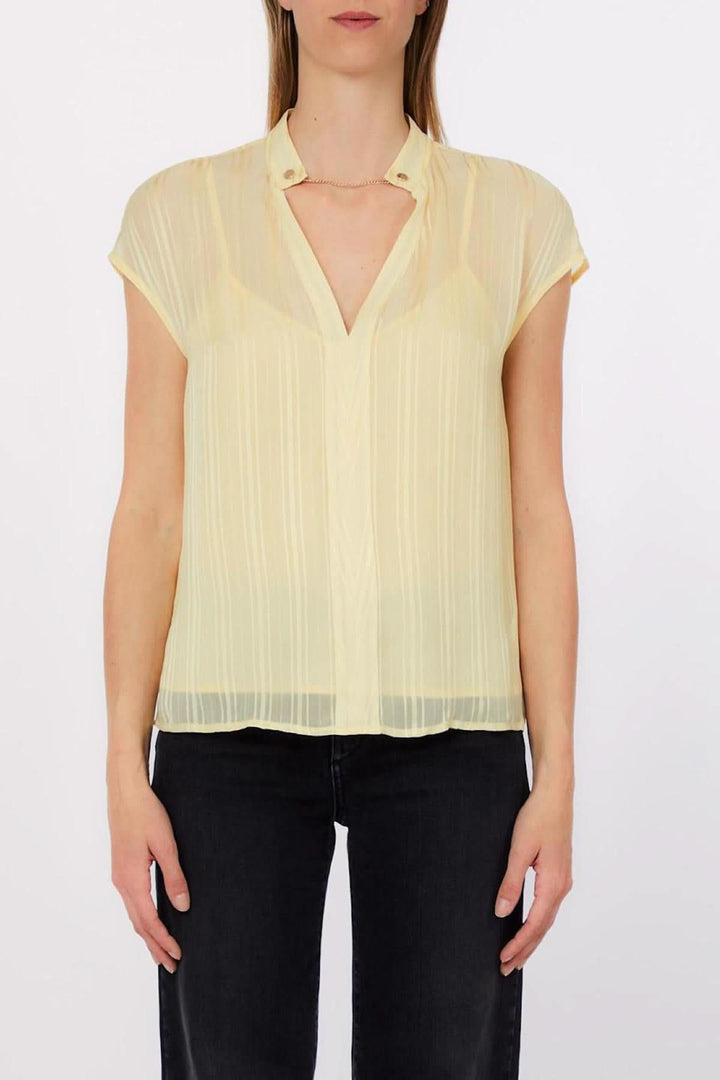 Flowy blouse with an open neckline