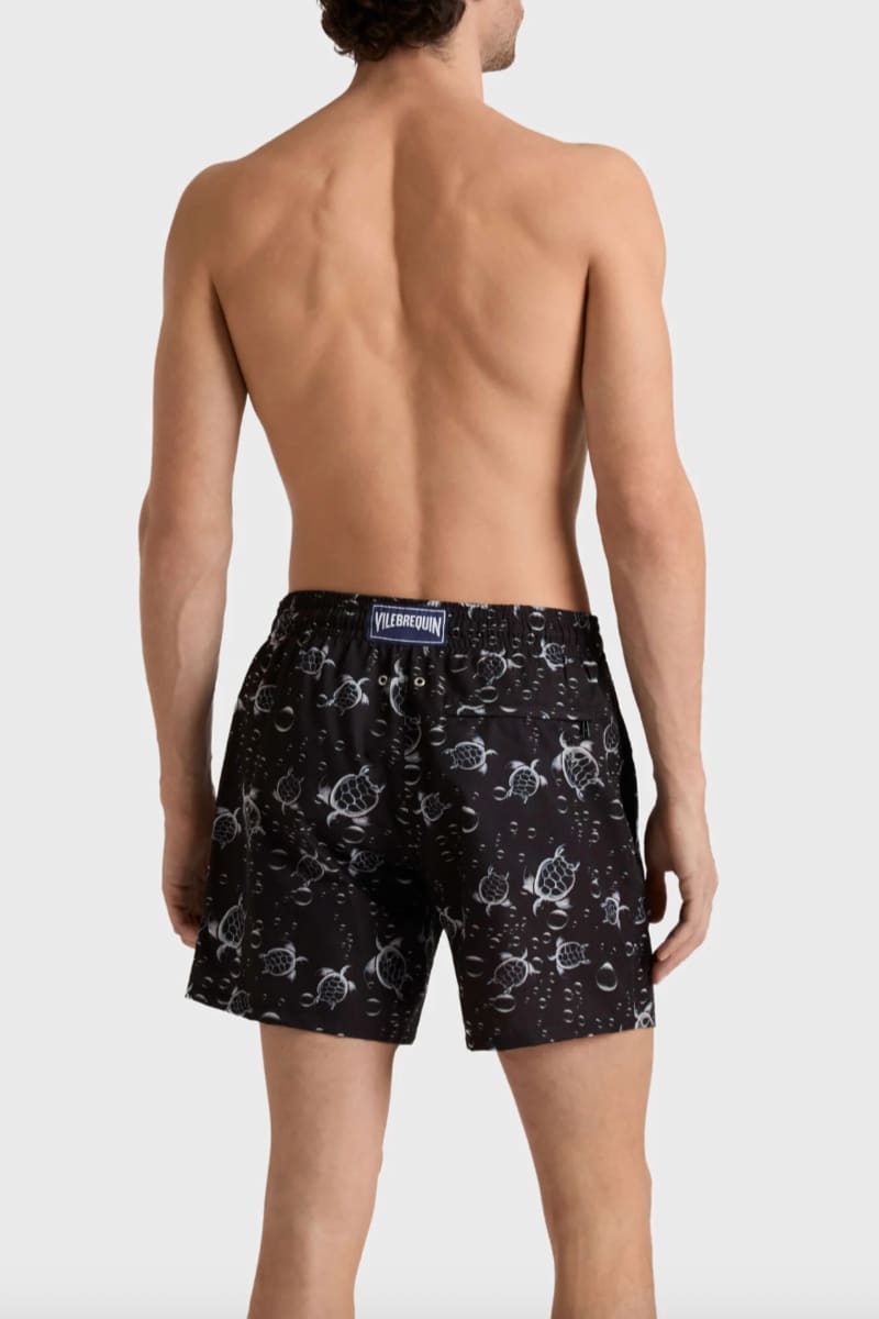 Front view of Vilebrequin men's swimsuit with multicolored turtles - Valérie Simon