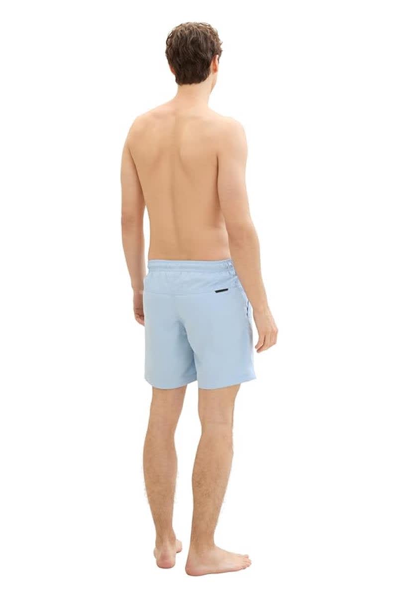 Side view of the blue Tom Tailor men's swimsuit with an elasticated back pocket - Valérie Simon