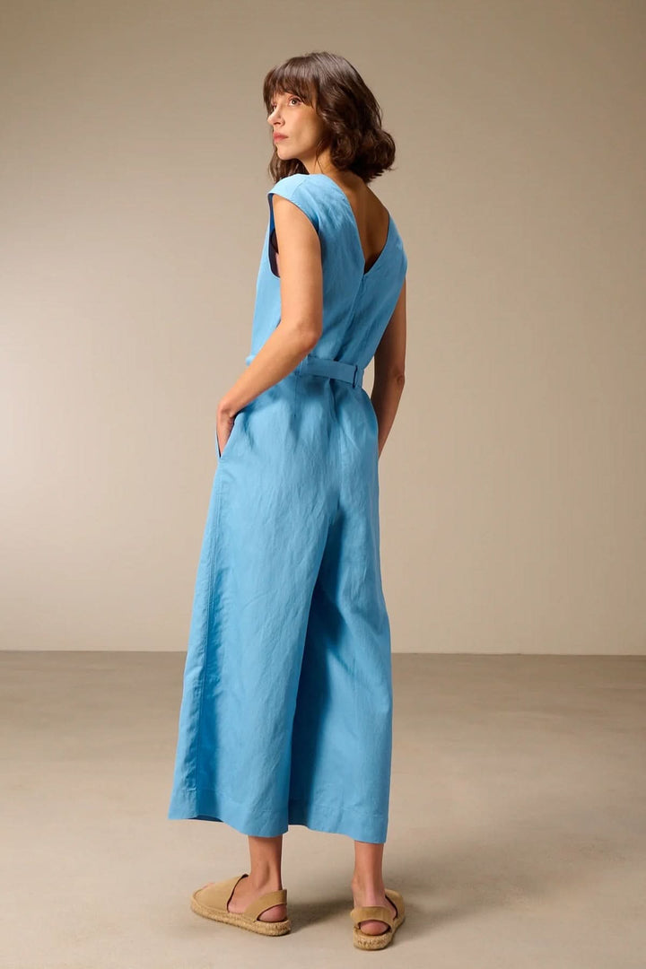Sleeveless jumpsuit with a tie-waist belt
