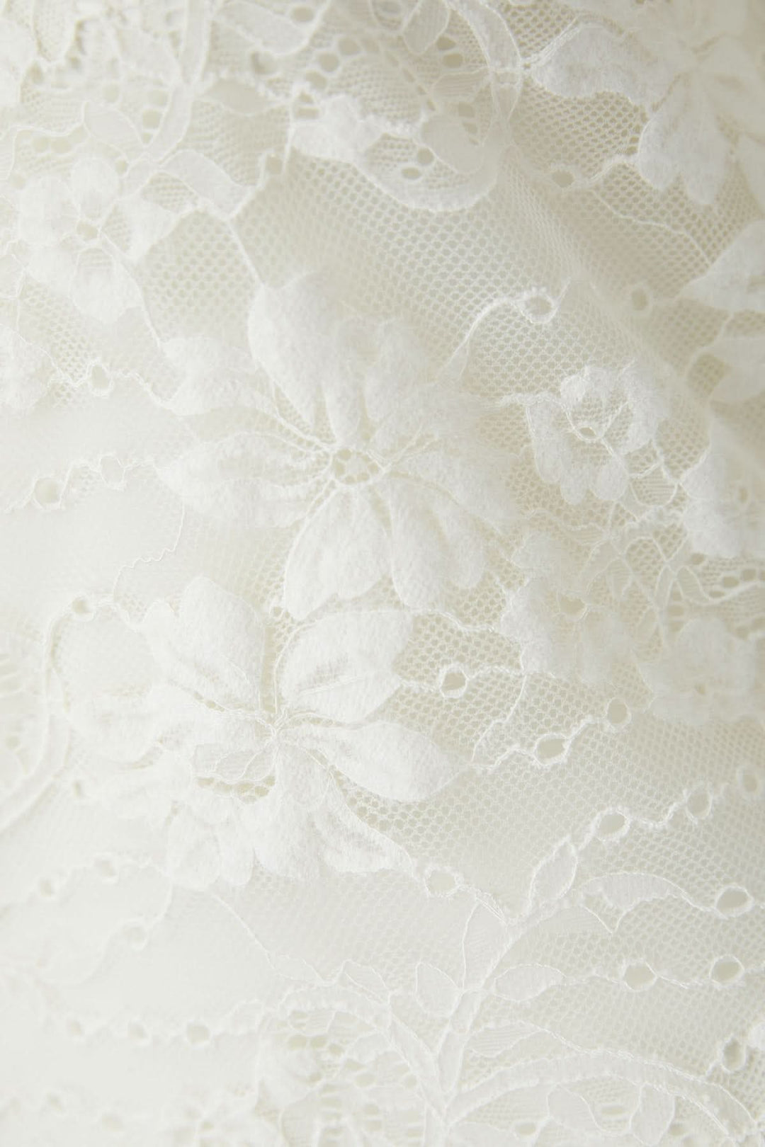 Haut en dentelle florale