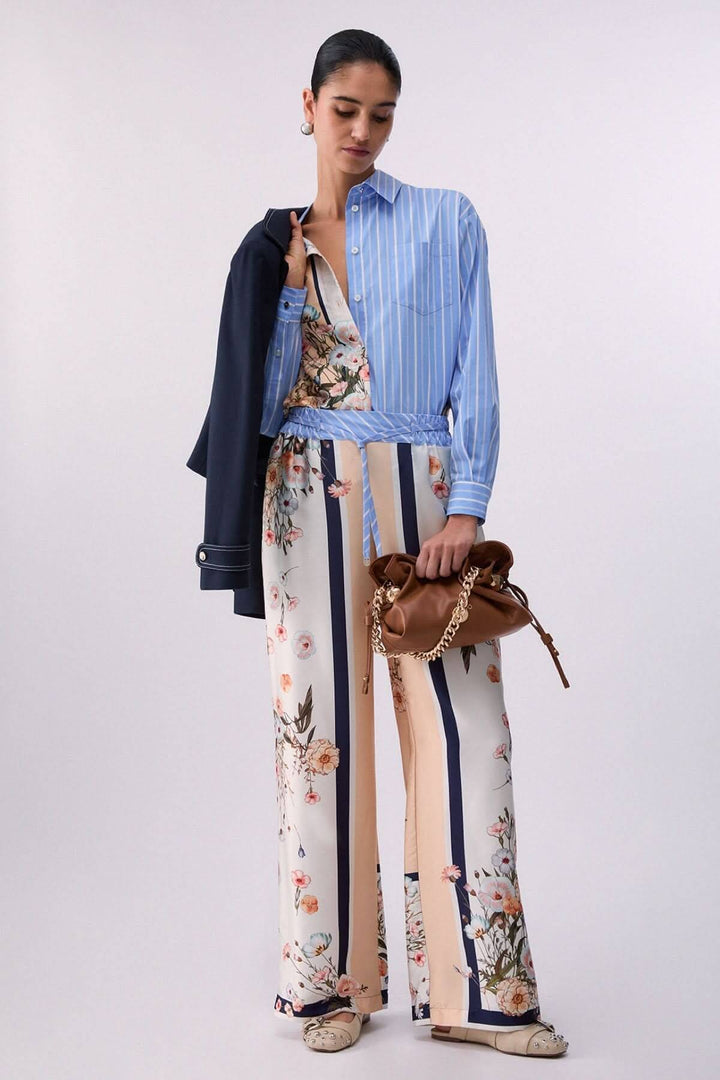 Pantalon fluide à motifs et rayures contrastées