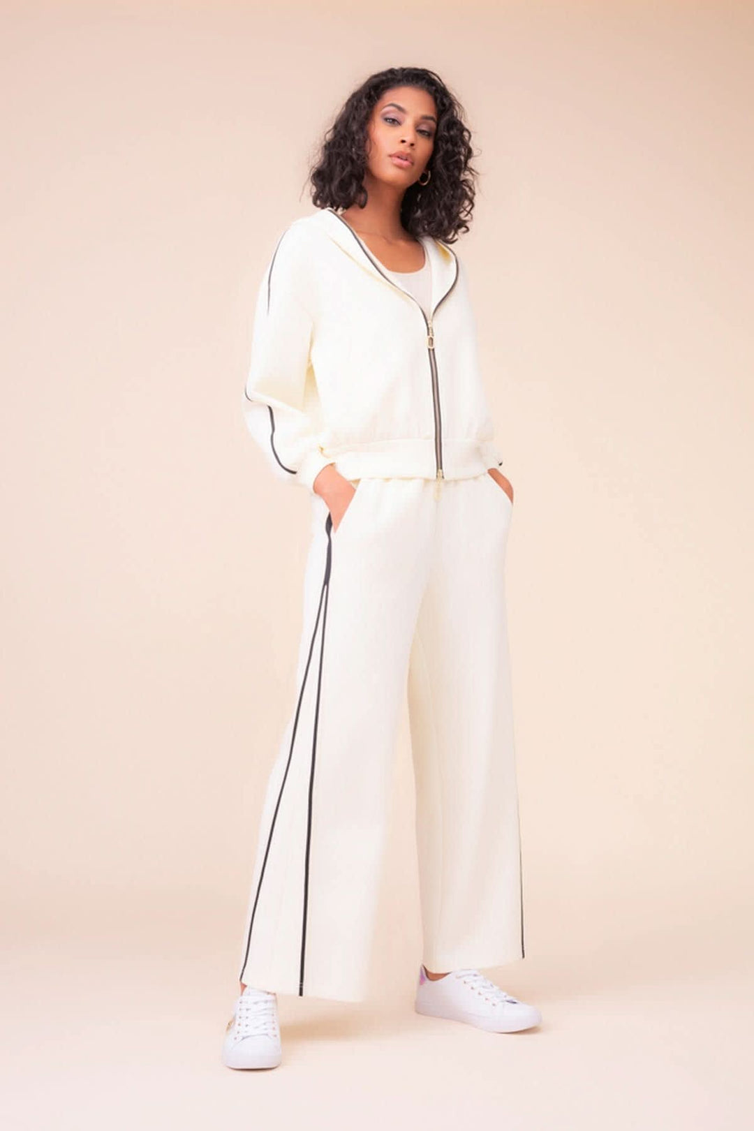 Women's black wide-leg pants with contrast stripes, front view, by Alison Sheri