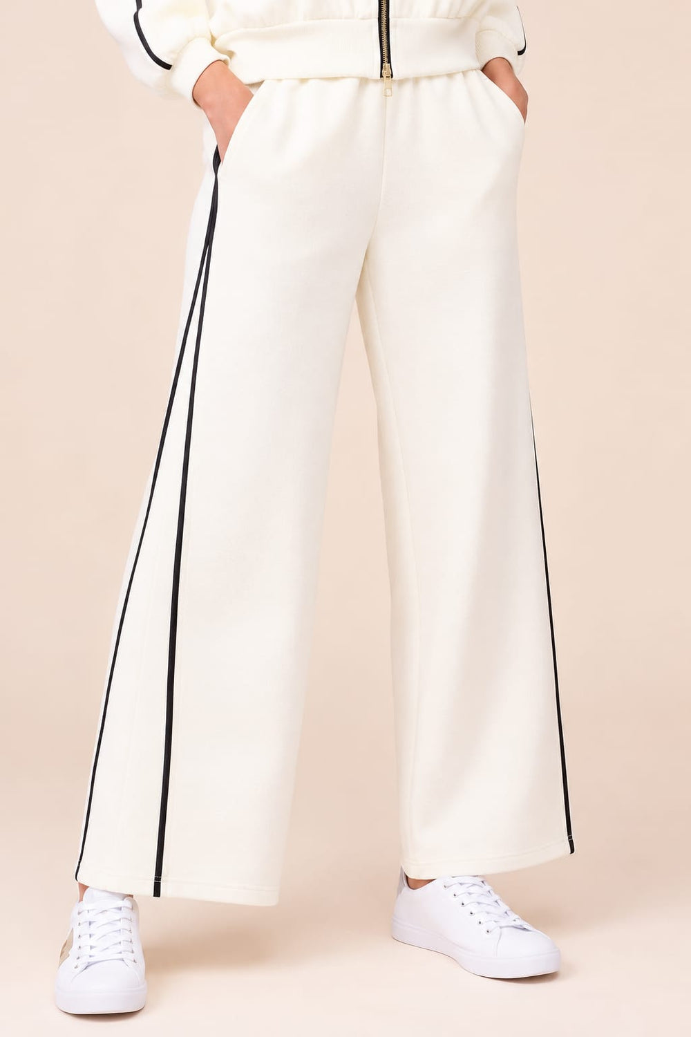 Women's wide-leg pants with contrast stripes, front view, by Alison Sheri