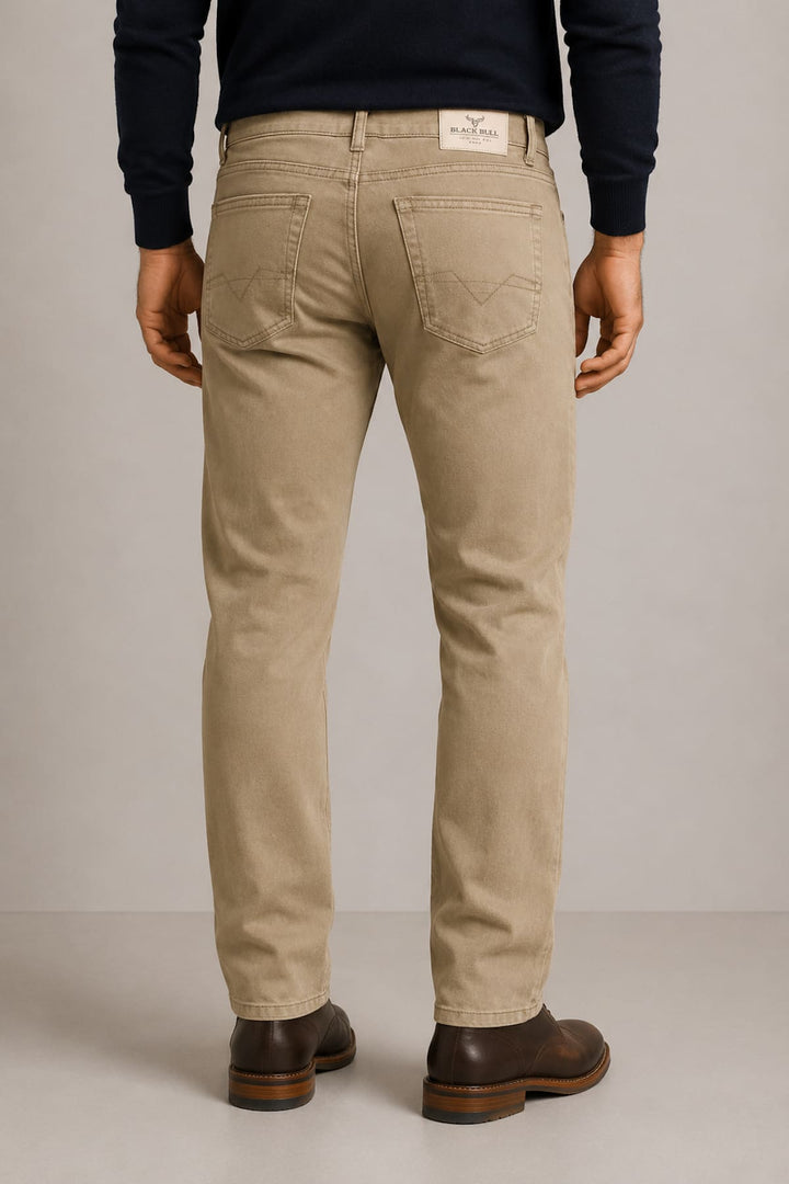 Vue de côté jean noir cinq poches extensible Black Bull pour homme - Valérie Simon
