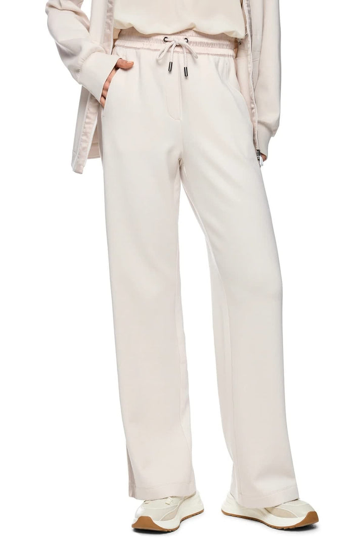 Vue de côté pantalon détente à bandes satinées noir Marc Cain pour femme - Valérie Simon