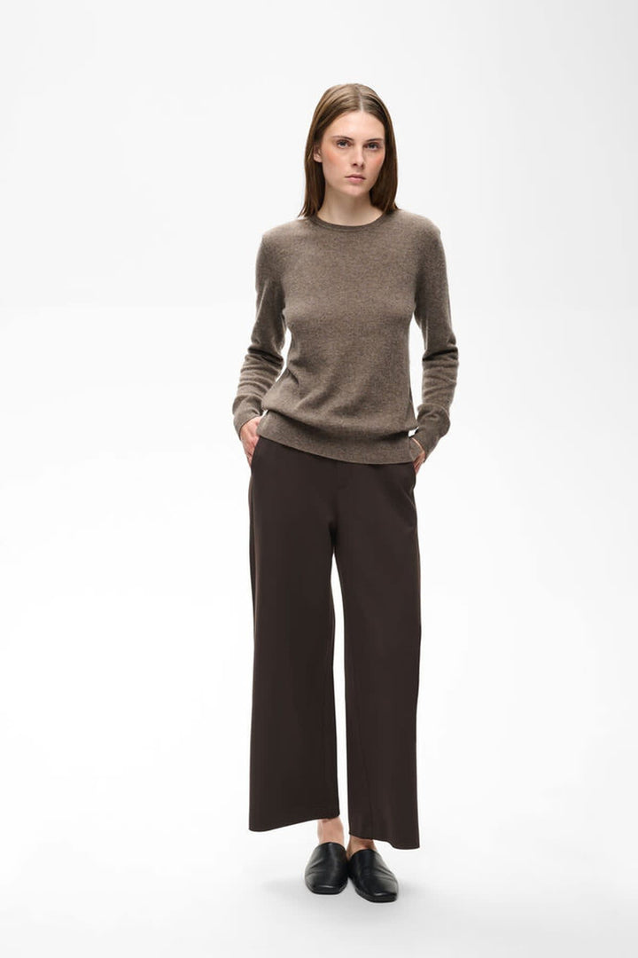 Vue de côté pantalon large Gincette Inwear noir avec plis élégants pour femme - Valérie Simon