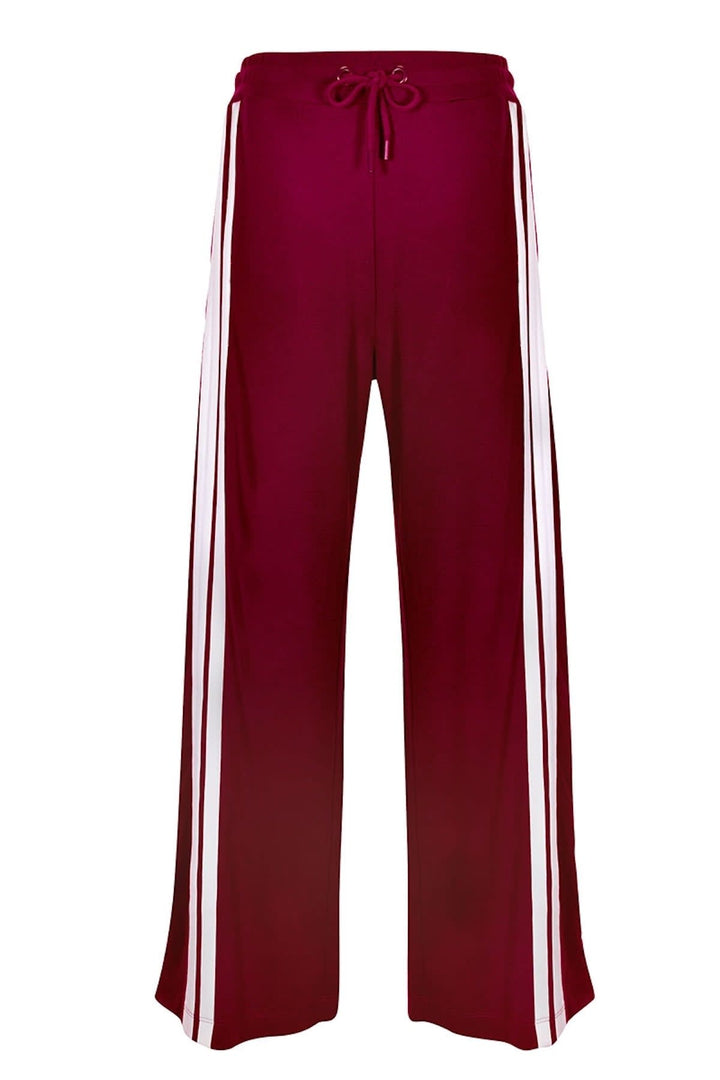 Pantalon jogging Lena à jambe large avec bandes latérales vue de face pour femme kennys