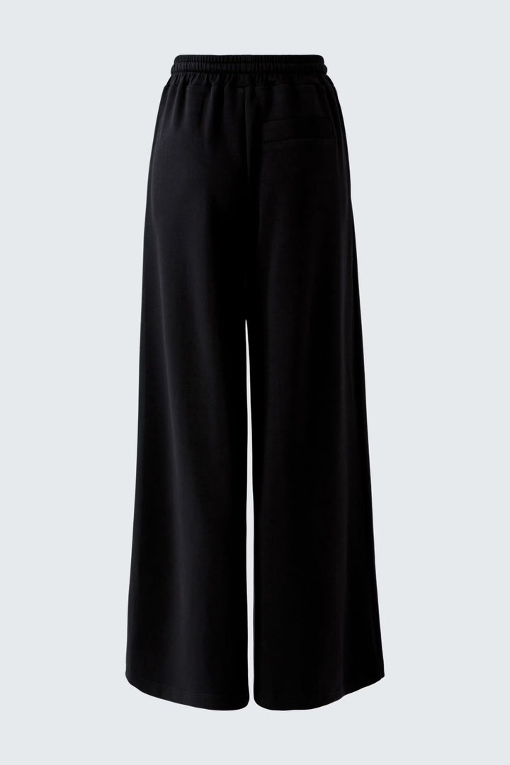 Vue de côté pantalon large Oui femme noir à taille élastique, poches latérales - Valérie Simon