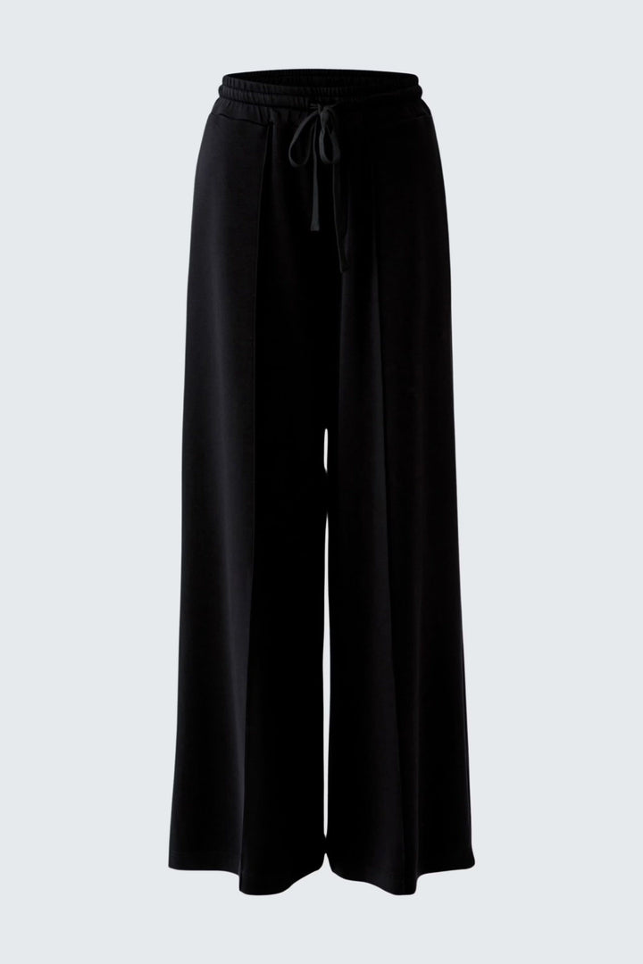 Vue de face pantalon large en lin blanc avec bande élastique Oui pour femme - Valérie Simon
