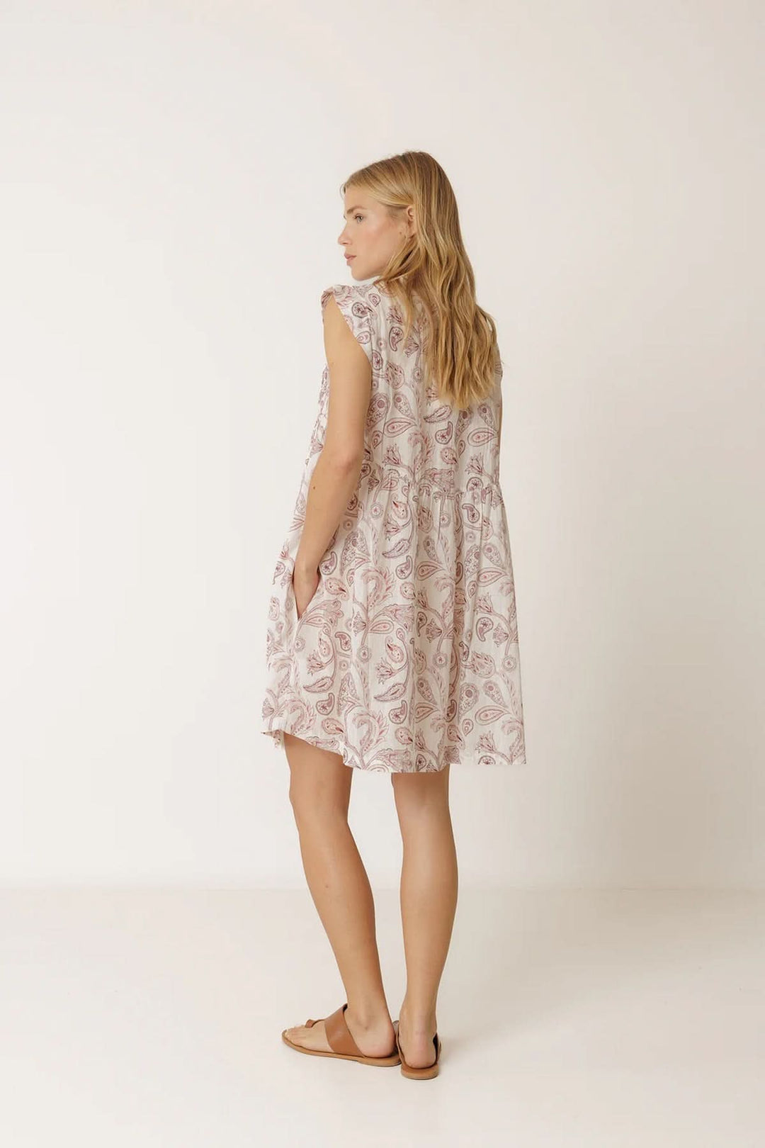 Short, flowing dress with a paisley print