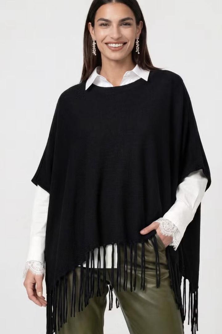Cape en maille à franges