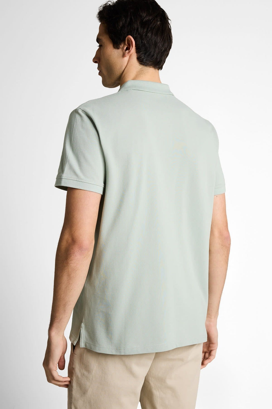 Vue de face polo Tom Tailor pour homme blanc avec logo, col côtelé - Valérie Simon