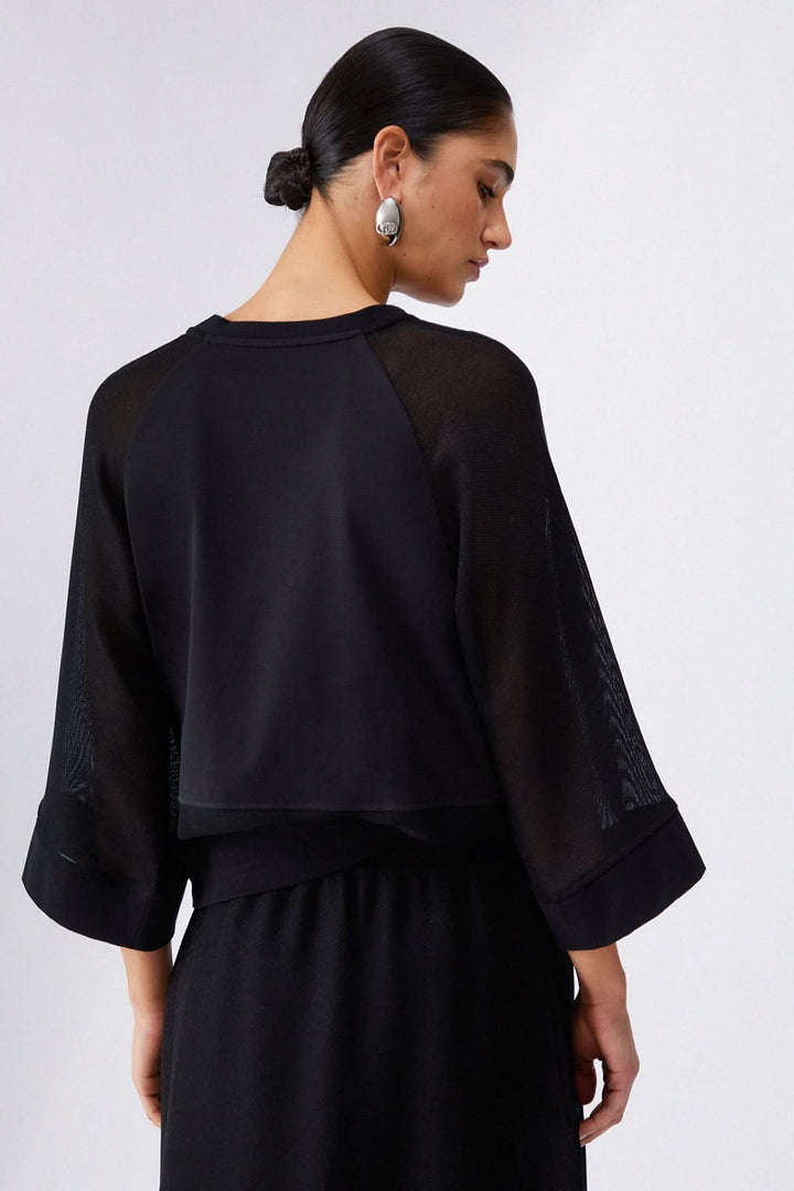 Cropped sweater with wide sleeves