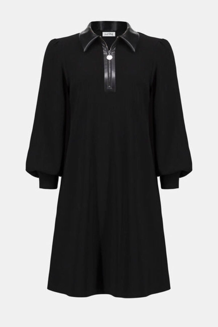 Robe élégante noire à col chemise en similicuir, coupe trapèze avec manches bouffantes et fermeture éclair.