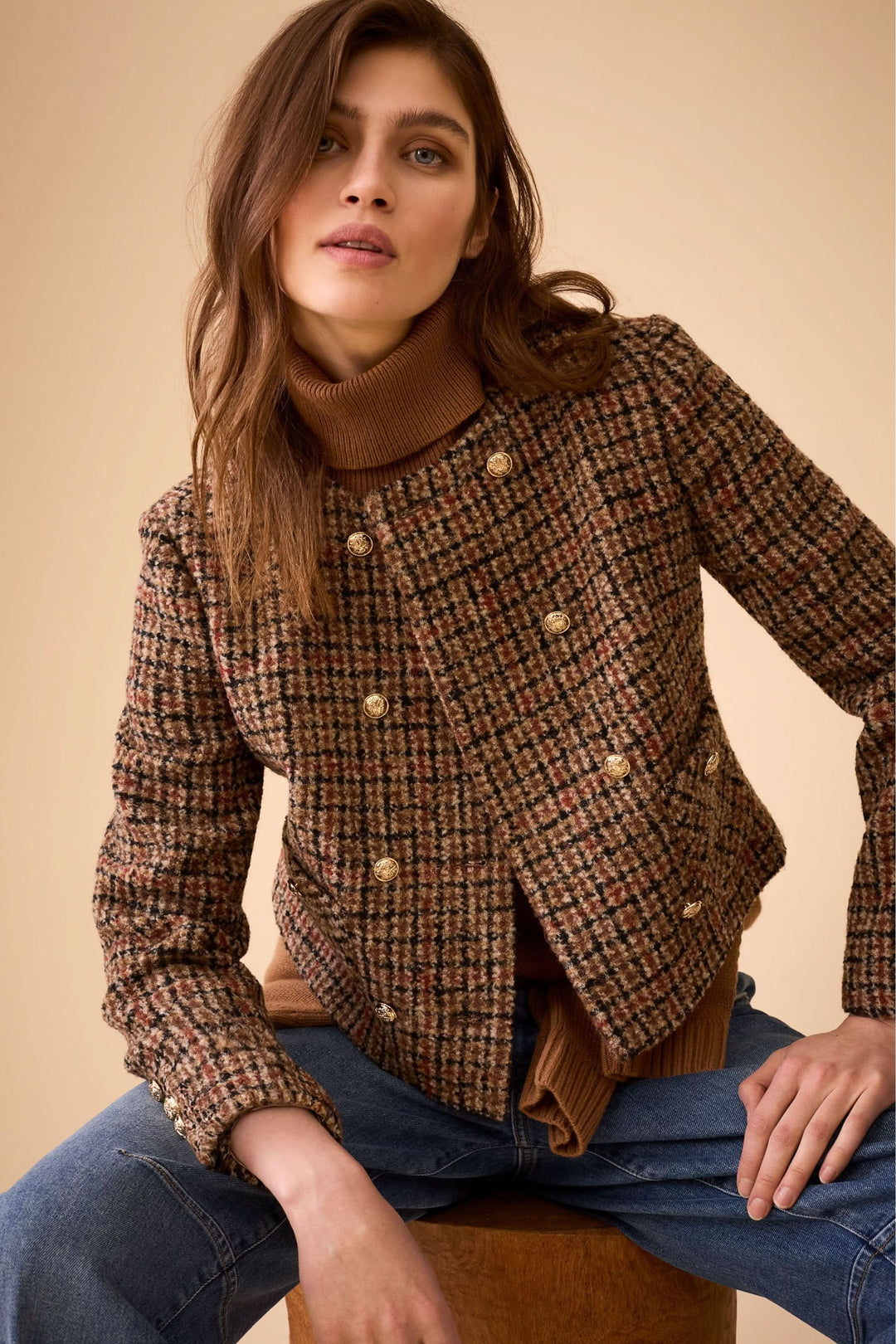 Sleeveless turtleneck sweater with openwork back