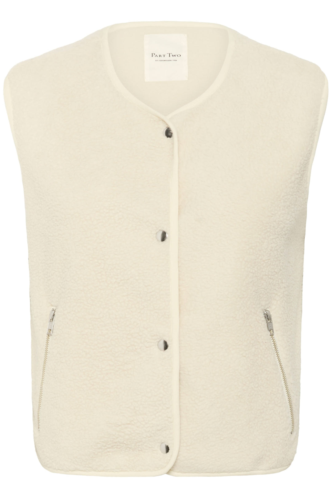 Veste sans manche Signy en tissu sherpa, coupe droite, teinte crème, fermeture à boutons-pression et poches zippées.