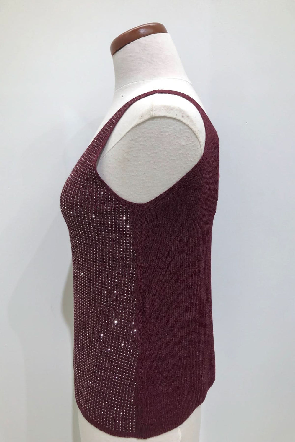 Camisole en V scintillante, tissu tricoté fin avec brillance, coupe droite et fluide.