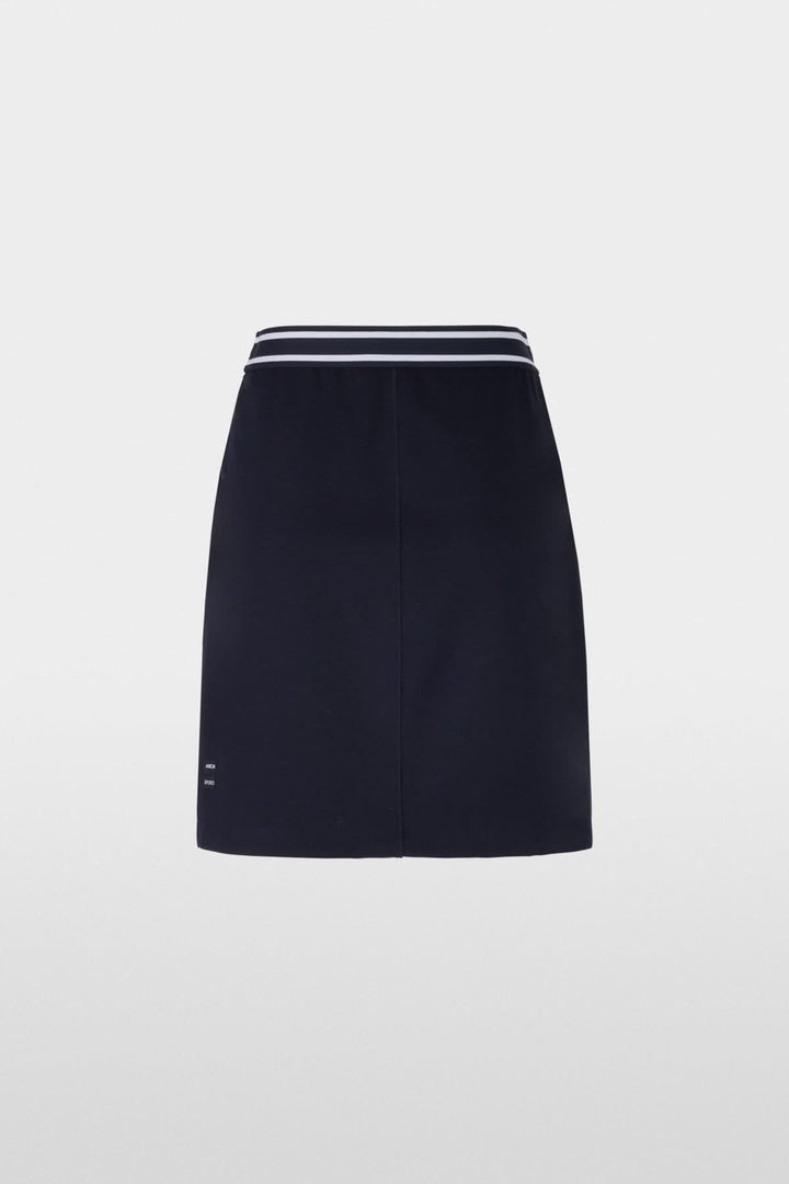 Jupe en maille bleu marine avec taille élastique à rayures blanches, parfaite pour un look graphique et soigné.