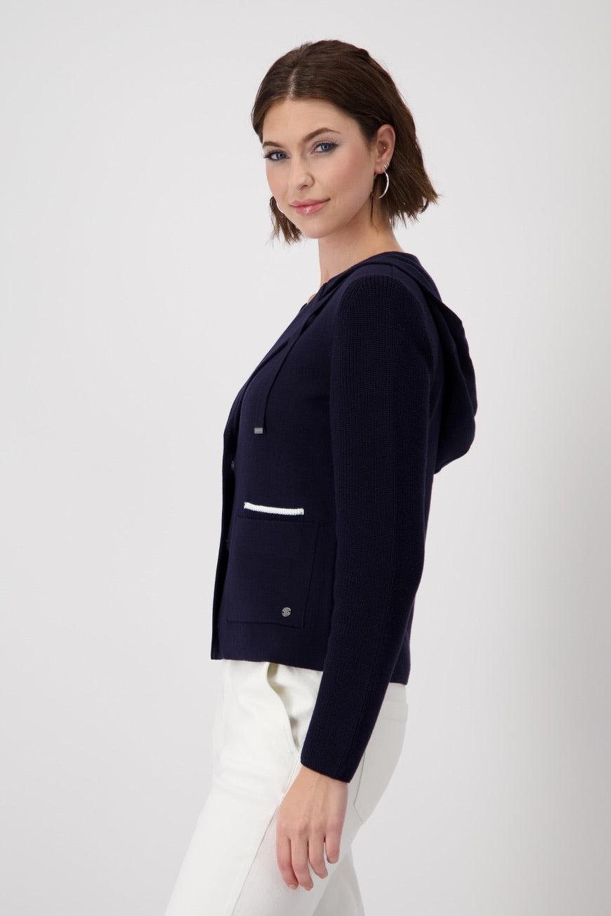 Jacket with knitted sleeves